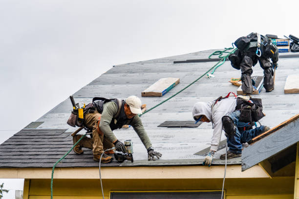 Professional Gutter Installation technician working in Plainfield, NH